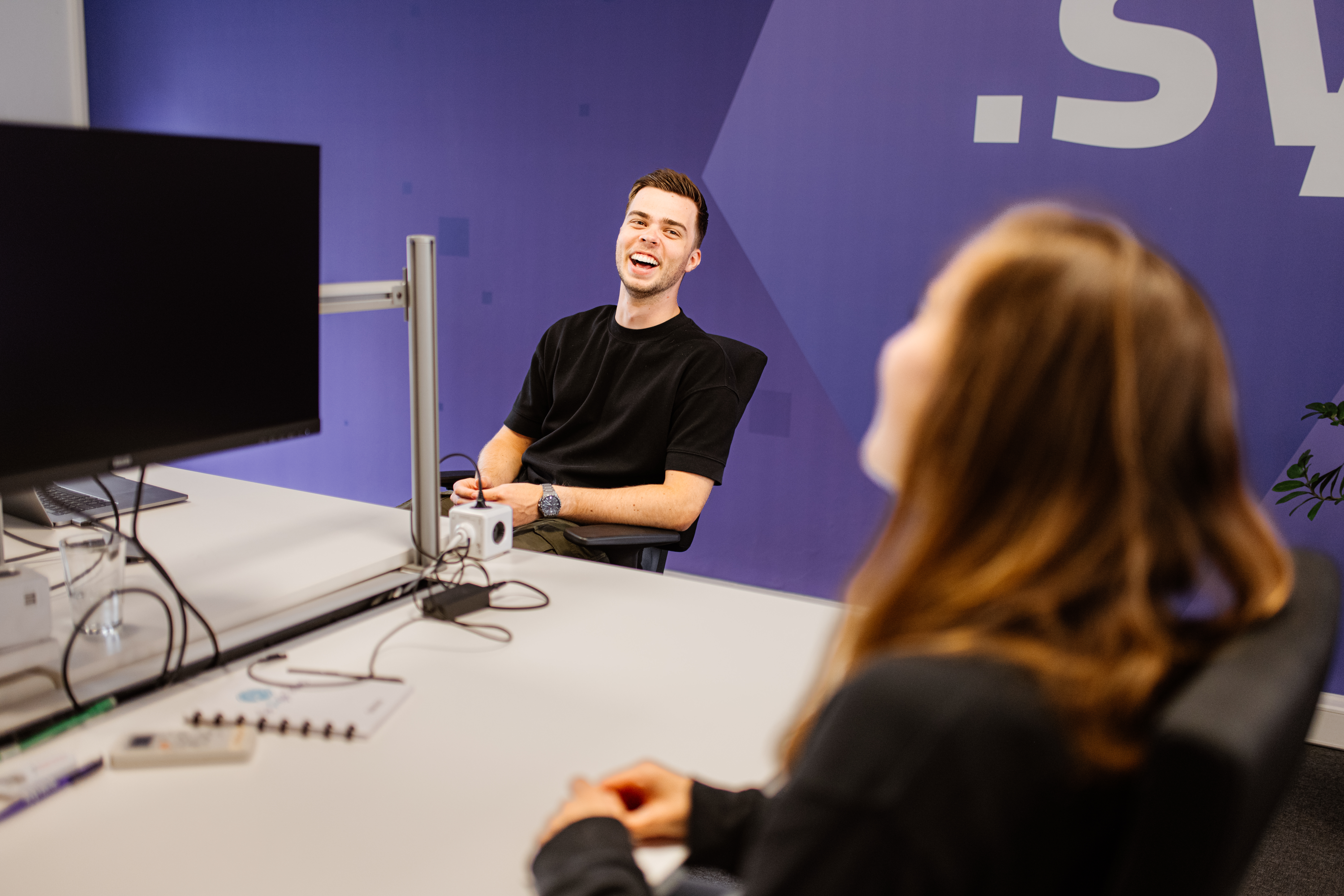 Synetic collega's op kantoor