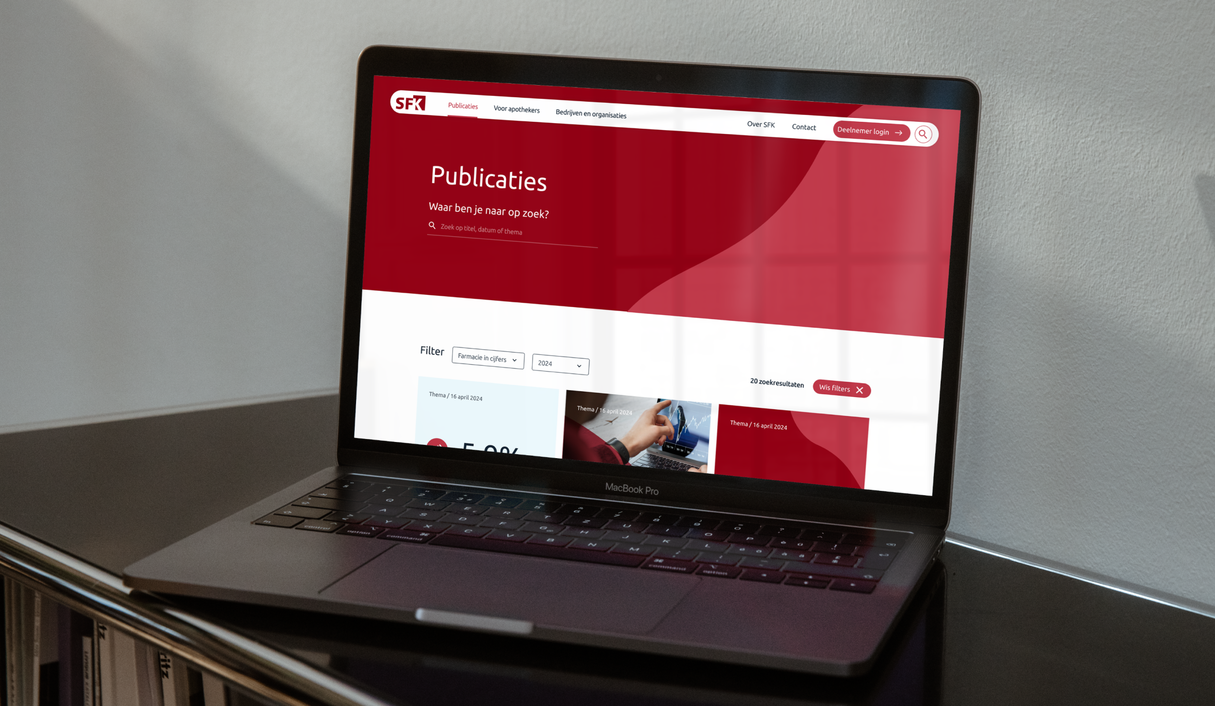Afbeelding van laptop met SFK website erop